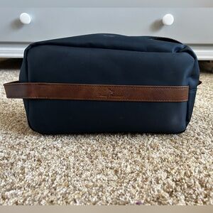 Tommy Bahama Men's canvas Navy Travel Dopp Kit with Brown Leather Trim